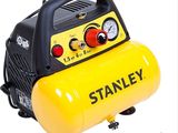 Compresseur d'air Stanley avec manomètres, sur fond blanc