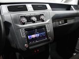 the interior of a car with a radio and a steering wheel