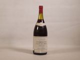 a bottle of wine that is sitting on a table