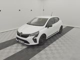 the white car is parked in the garage on the checkered floor
