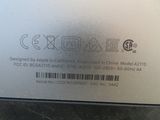 the back of an apple iphone with a barcode sticker on it