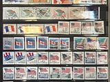 an image of a collection of postage stamps on display in a glass case