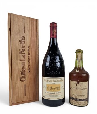 two bottles of wine and a wooden box on a white background