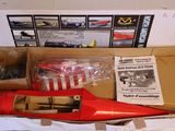 a cardboard box with a model of a plane in it