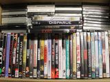 a box full of dvds sitting on top of a table