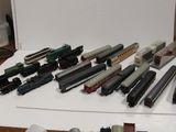a lot of toy trains sitting on a table