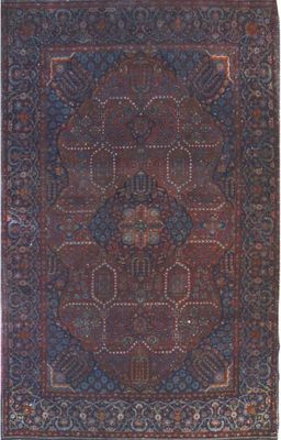 an antique persian rug with a blue and red design