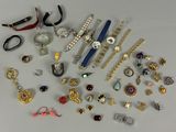 many different types of jewelry on the table