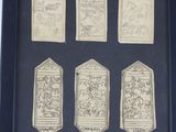 a picture of a picture of a group of plaques in a black frame