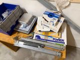 a lot of tools on a workbench in a garage