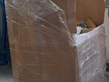 a large box sitting on a pallet in a warehouse