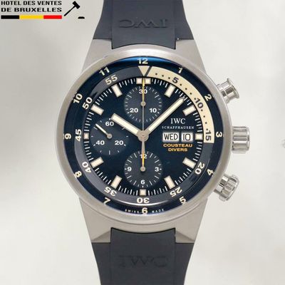 a close up of a watch on a white background