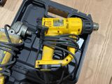 two electric drillets in a case on the floor