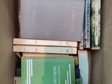 a box full of books that are sitting inside of it