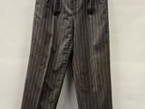 a close up of a pair of pants hanging on a hanger