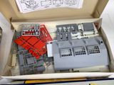 a box with a bunch of legos inside of it