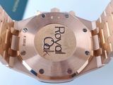 an image of a close up of a wrist watch with a book in the background