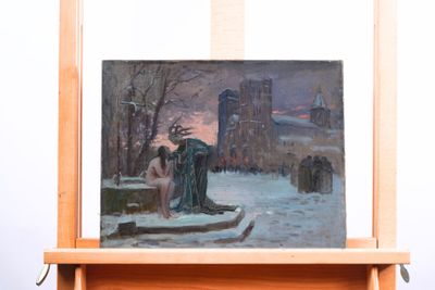 a painting on a easel with a painting of a woman in the snow
