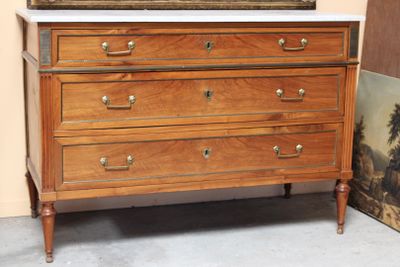 a picture of a dresser with a mirror on top of it