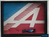 a picture of a picture of a racing car in a shadow box