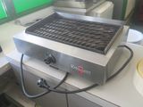 a grill that is sitting on top of a counter