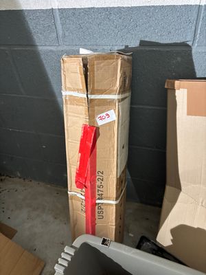 a box that is sitting on top of a pile of boxes