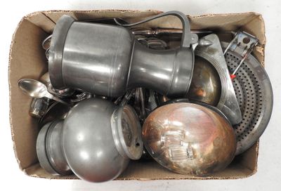 many pots and pans in a box on the table