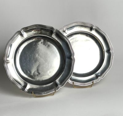 pair of silverplated plates with scalloped rims
