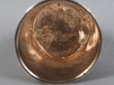 a close up of a metal object on a table