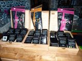 a lot of tea bags in a wooden box on a table