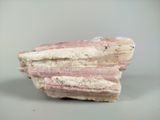 a rock that has a very large piece of rock on top of it