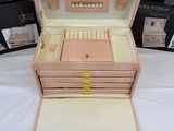 a small wooden box that is open on a table