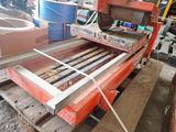a picture of a machine that is working on a piece of wood
