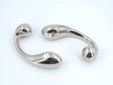 pair of silver plated cuff bracelets on white background