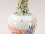 a vase that has a picture of a woman on it