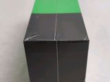 a black box with a green strip on it