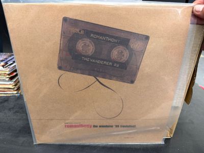 a cardboard box with a picture of a cassette inside of it