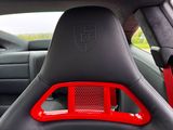 a close up of a car ' s interior with a steering wheel