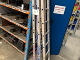 a lot of shelves that have various tools on them