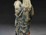an image of a statue of a woman holding a child