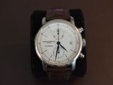 a watch that is sitting on top of a table