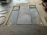 une photo d'une grille métallique dans un garage