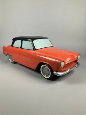 3d model of an orange car with a black top