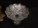a glass bowl that is sitting on a table
