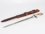 knife and sheath on a white surface