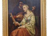 un tableau représentant une femme assise sur une chaise en train de lire un livre