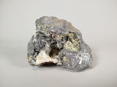 an image of a piece of rock that has some kind of substance on it