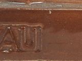 a brown bottle that has a brown label on it