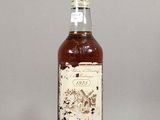 an image of a bottle of whiskey sitting on top of a table