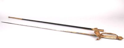 two swords that are sitting on a white surface